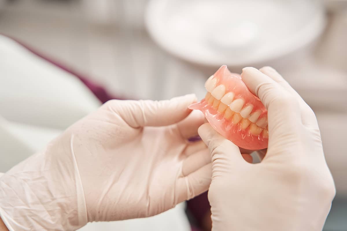 false teeth dentures fulham road dental