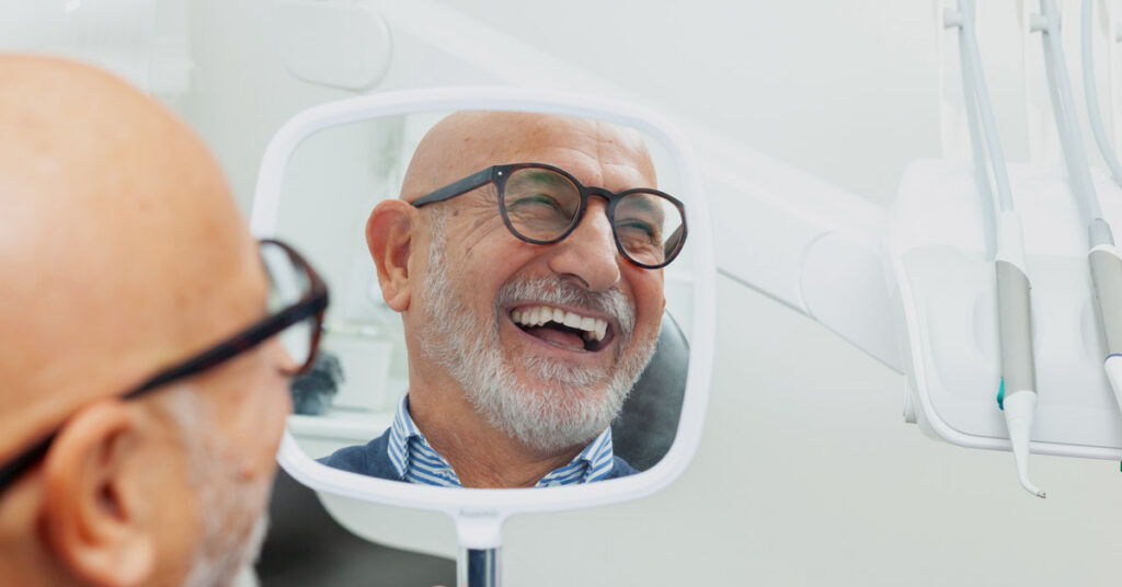 older man smile dentists