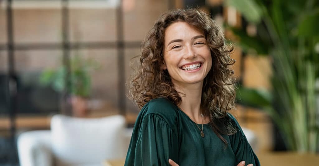 choosing the right artificial teeth options woman smiling