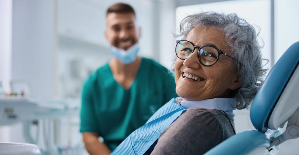 woman at dentists restorative dentistry prevents dental complications