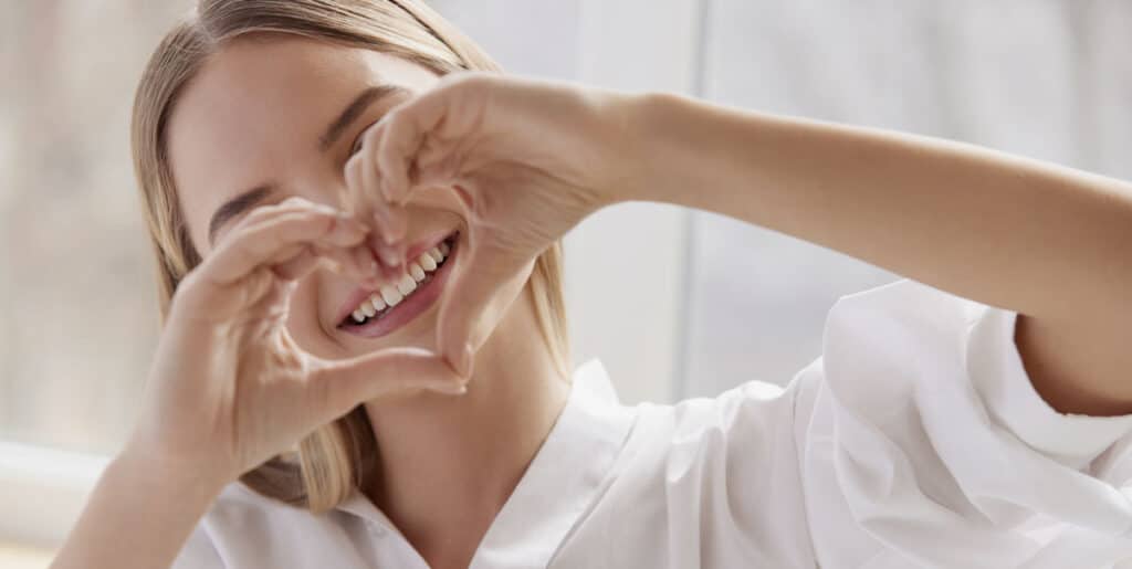 woman smiling tooth whitening becoming popular