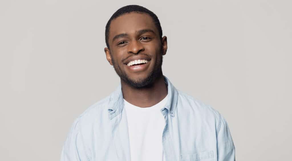 man smiling benefits of teeth whitening fulham